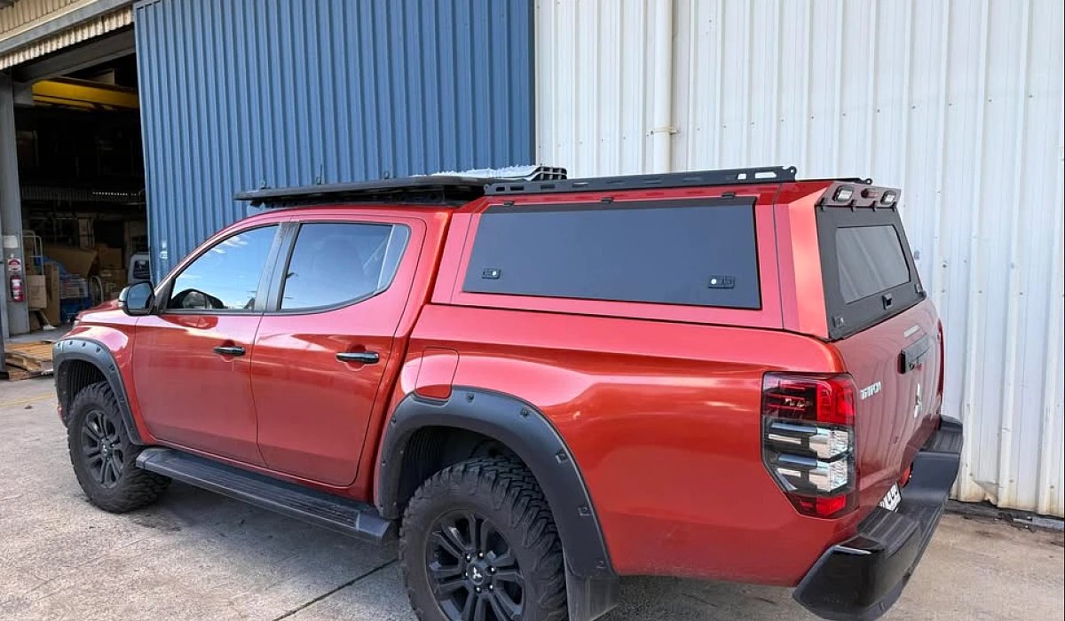 Mitsubishi Triton · 2018-2023 with Gen 2 canopy, sprayed Rally Red