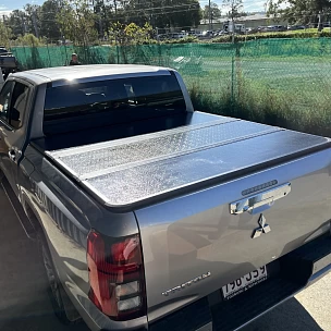 Image of Tri-Fold Hard Tonneau Cover for Mitsubishi Triton MV Dual Cab 2024+