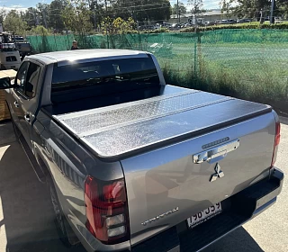 Image of Tri-Fold Hard Tonneau Cover for Mitsubishi Triton MV Dual Cab 2024+