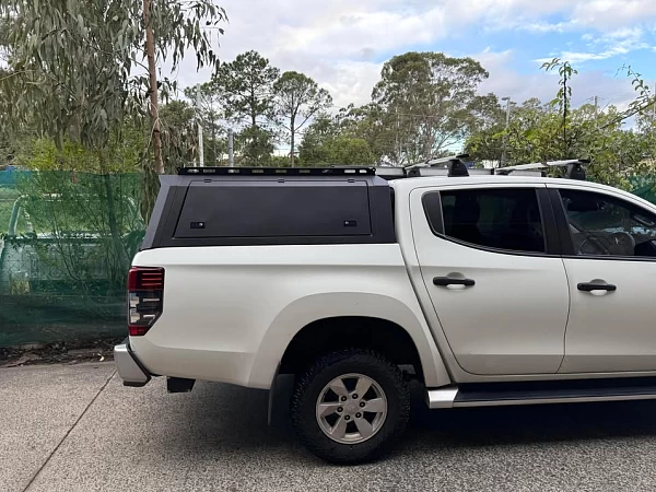 Mitsubishi Triton fitted with Gen 2 Steel Canopy for Mitsubishi Triton MR MQ + with Pet Window Doors  - View 1