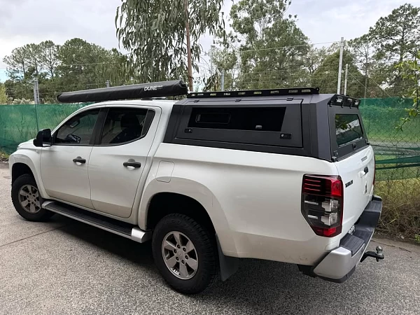 Mitsubishi Triton fitted with Gen 2 Steel Canopy for Mitsubishi Triton MR MQ + with Pet Window Doors  - View 2