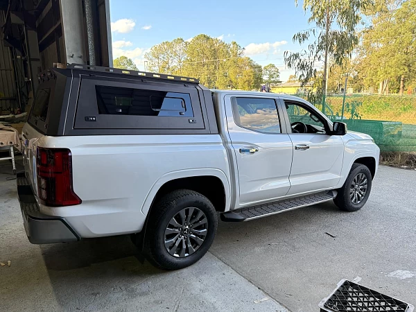 Mitsubishi Triton fitted with Gen 2 Steel Canopy for Mitsubishi Triton MV + with Pet Window Doors  - View 2